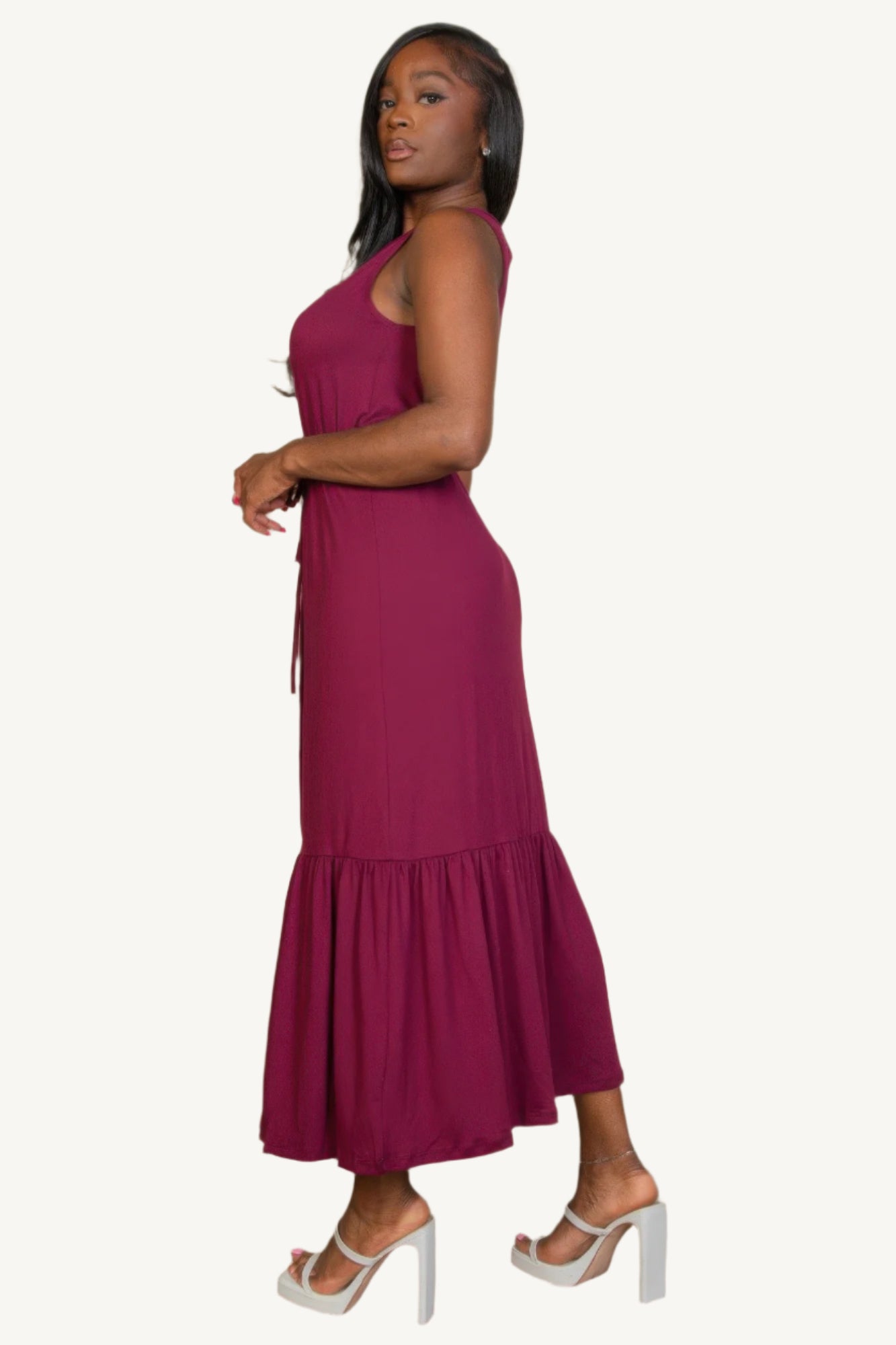"Sleeveless jersey maxi dress with button front and tie waist – lightweight, stretchy fabric for a flattering, relaxed summer look."