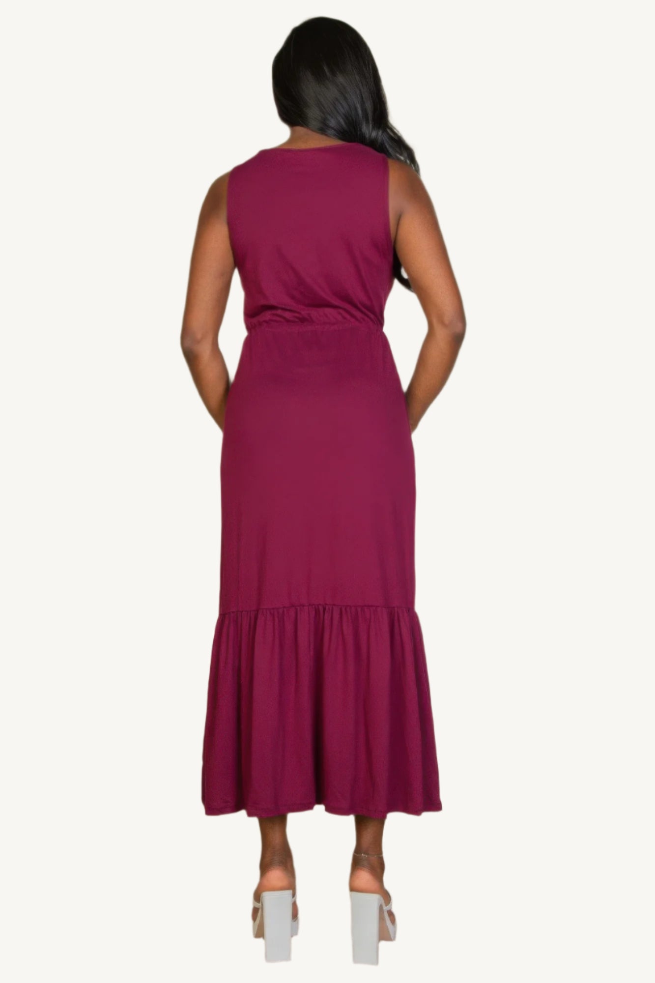 "Sleeveless jersey maxi dress with button front and tie waist – lightweight, stretchy fabric for a flattering, relaxed summer look."