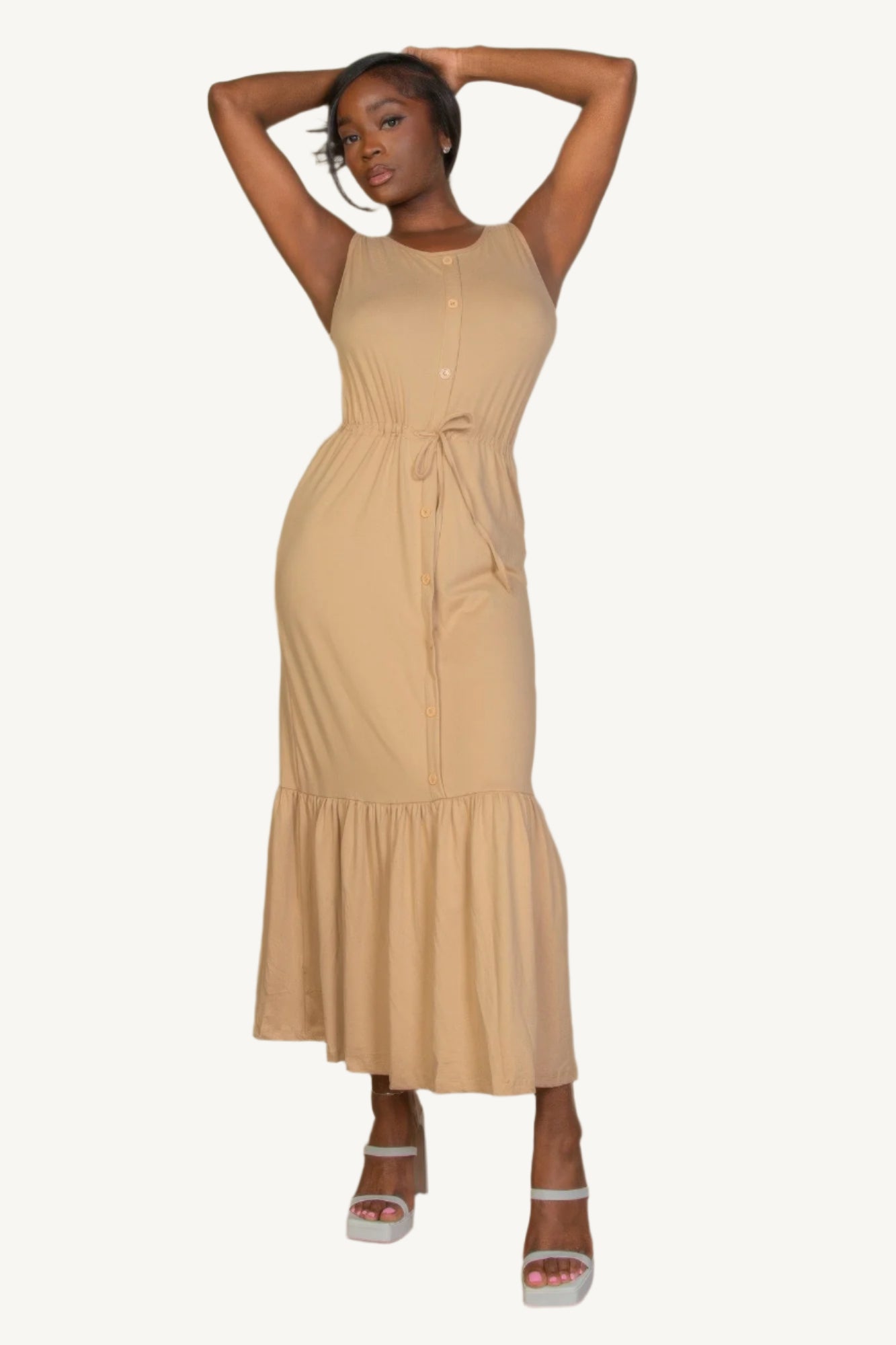 "Sleeveless jersey maxi dress with button front and tie waist – lightweight, stretchy fabric for a flattering, relaxed summer look."
