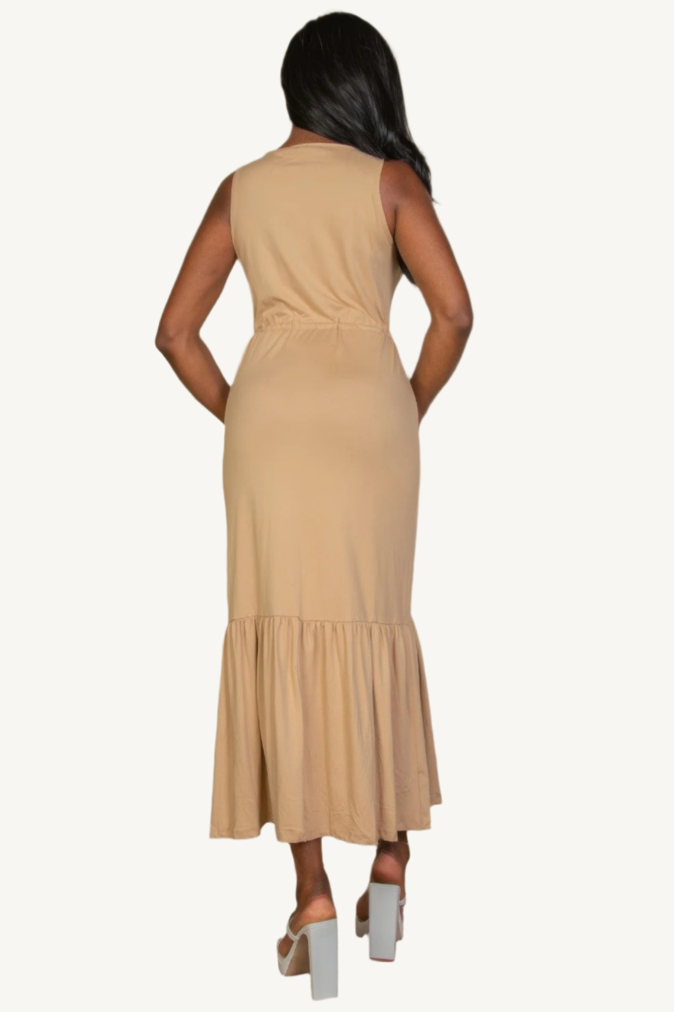 "Sleeveless jersey maxi dress with button front and tie waist – lightweight, stretchy fabric for a flattering, relaxed summer look."