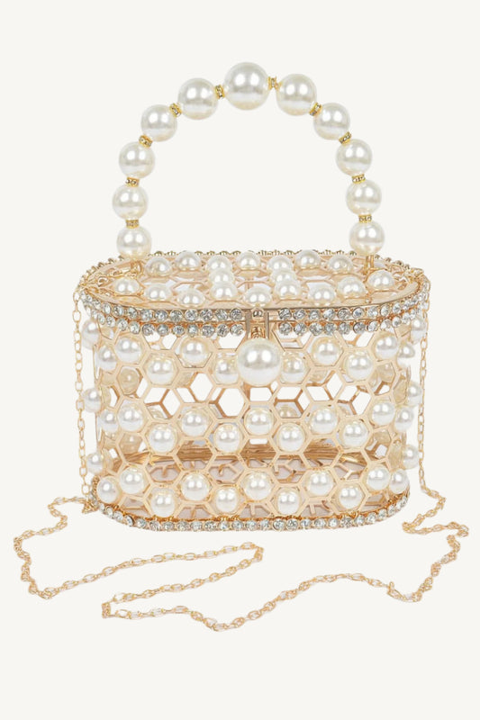 "Elegant mesh party clutch with faux pearls and rhinestones – sparkling evening accessory."