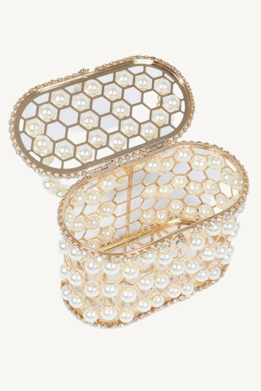 "Elegant mesh party clutch with faux pearls and rhinestones – sparkling evening accessory."