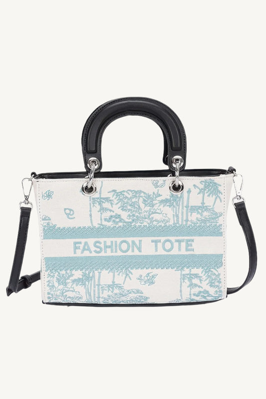 “Stylish embroidery faux leather tote bag with intricate detailing, elegant and timeless design.”