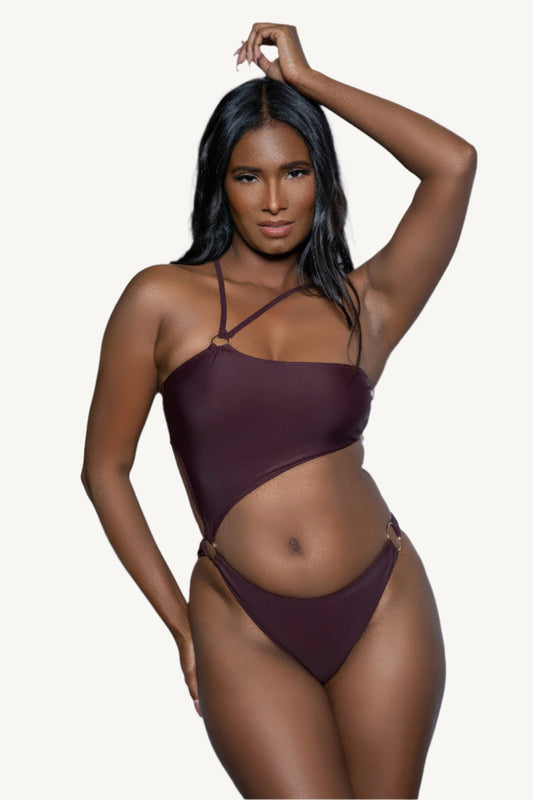 One-shoulder one-piece swimsuit with asymmetrical cutouts, strappy details, and metal ring accents – sleek, supportive, and designed for bold summer style.
