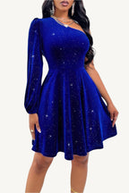 One-shoulder velvet dress with dramatic lantern sleeve and cinched waist, made from a soft, stretchy polyester-elastane blend – elegant, bold, and statement-making.