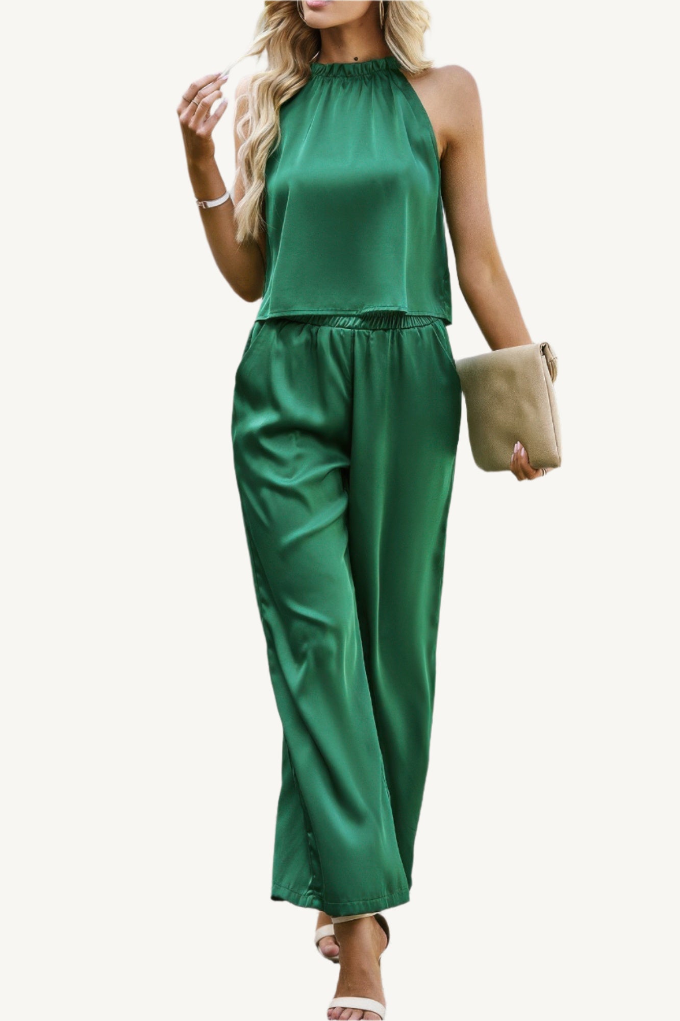 Two-piece set with sleeveless top and wide-leg pants, made from a soft polyester-elastane blend – stretchy, comfortable, and effortlessly stylish.