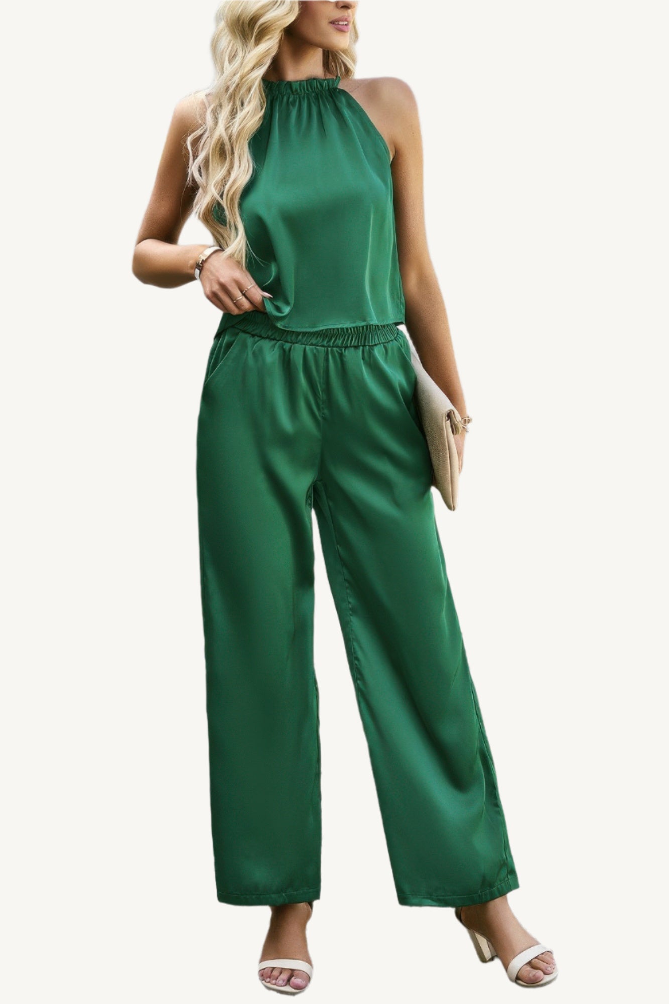 Two-piece set with sleeveless top and wide-leg pants, made from a soft polyester-elastane blend – stretchy, comfortable, and effortlessly stylish.