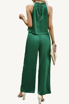 Two-piece set with sleeveless top and wide-leg pants, made from a soft polyester-elastane blend – stretchy, comfortable, and effortlessly stylish.