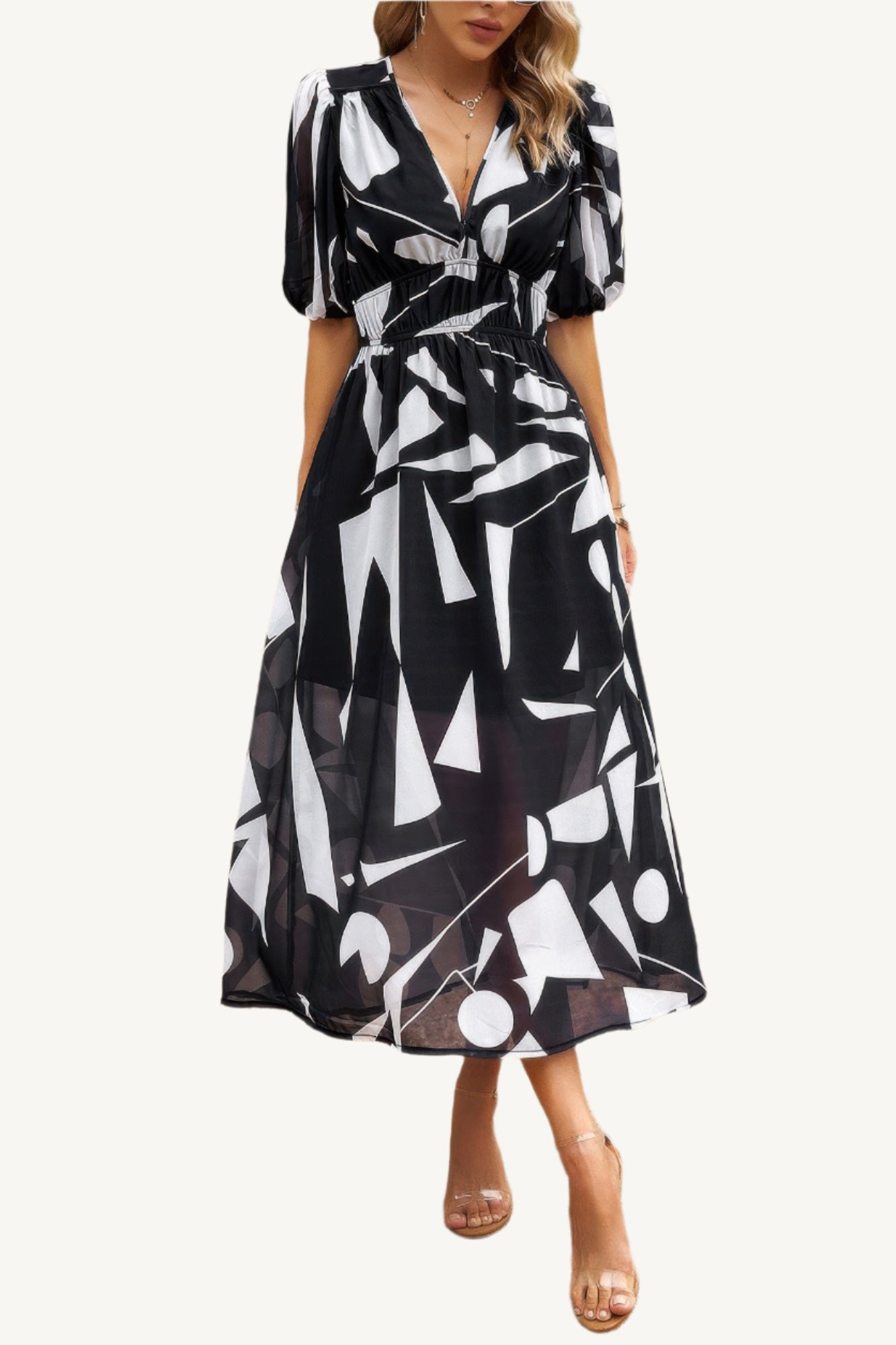 Boho-style midi dress with V-neckline, elastic waist, and flowy silhouette – made from 100% viscose for breathable, lightweight comfort.