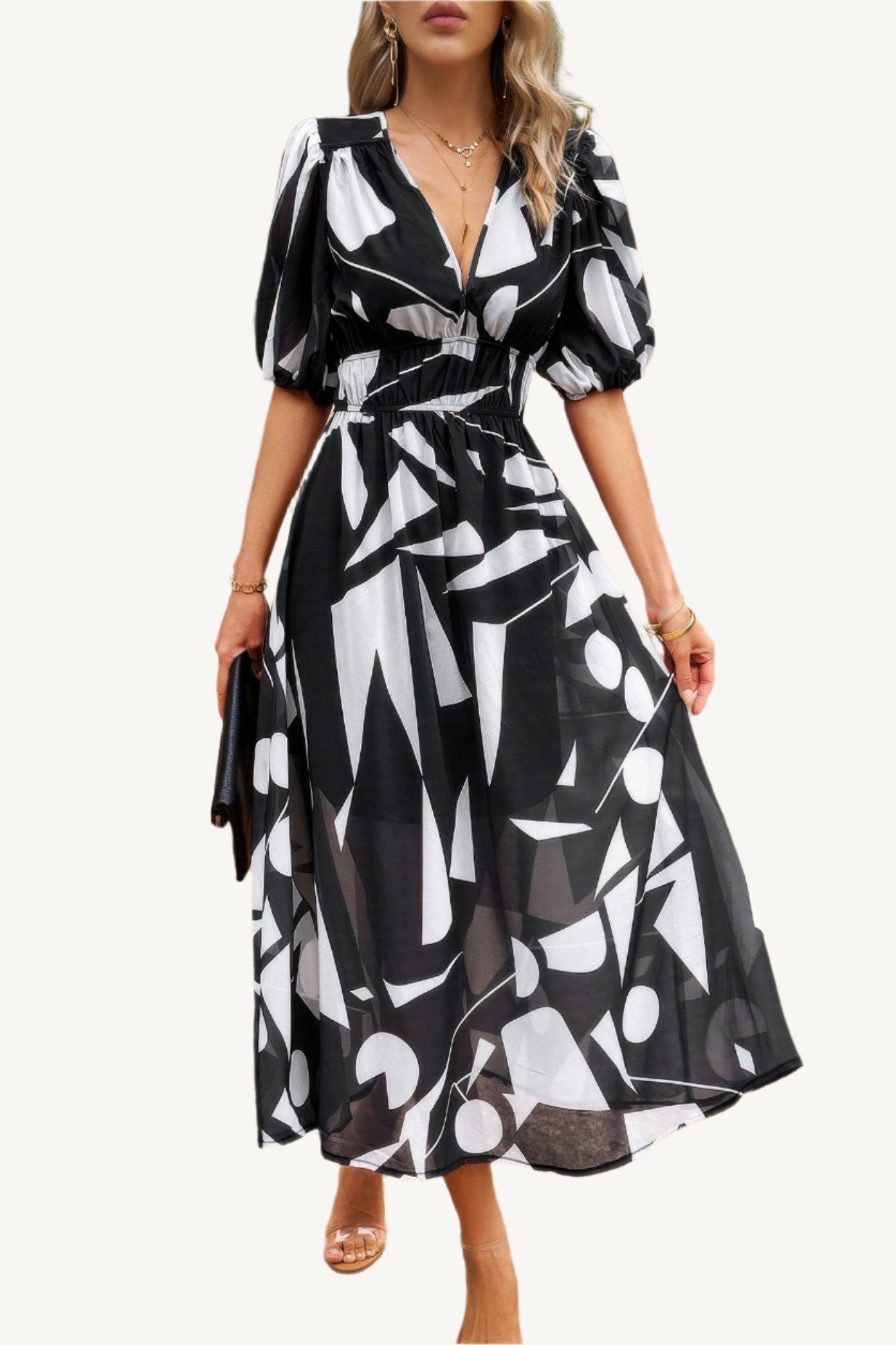 Boho-style midi dress with V-neckline, elastic waist, and flowy silhouette – made from 100% viscose for breathable, lightweight comfort.