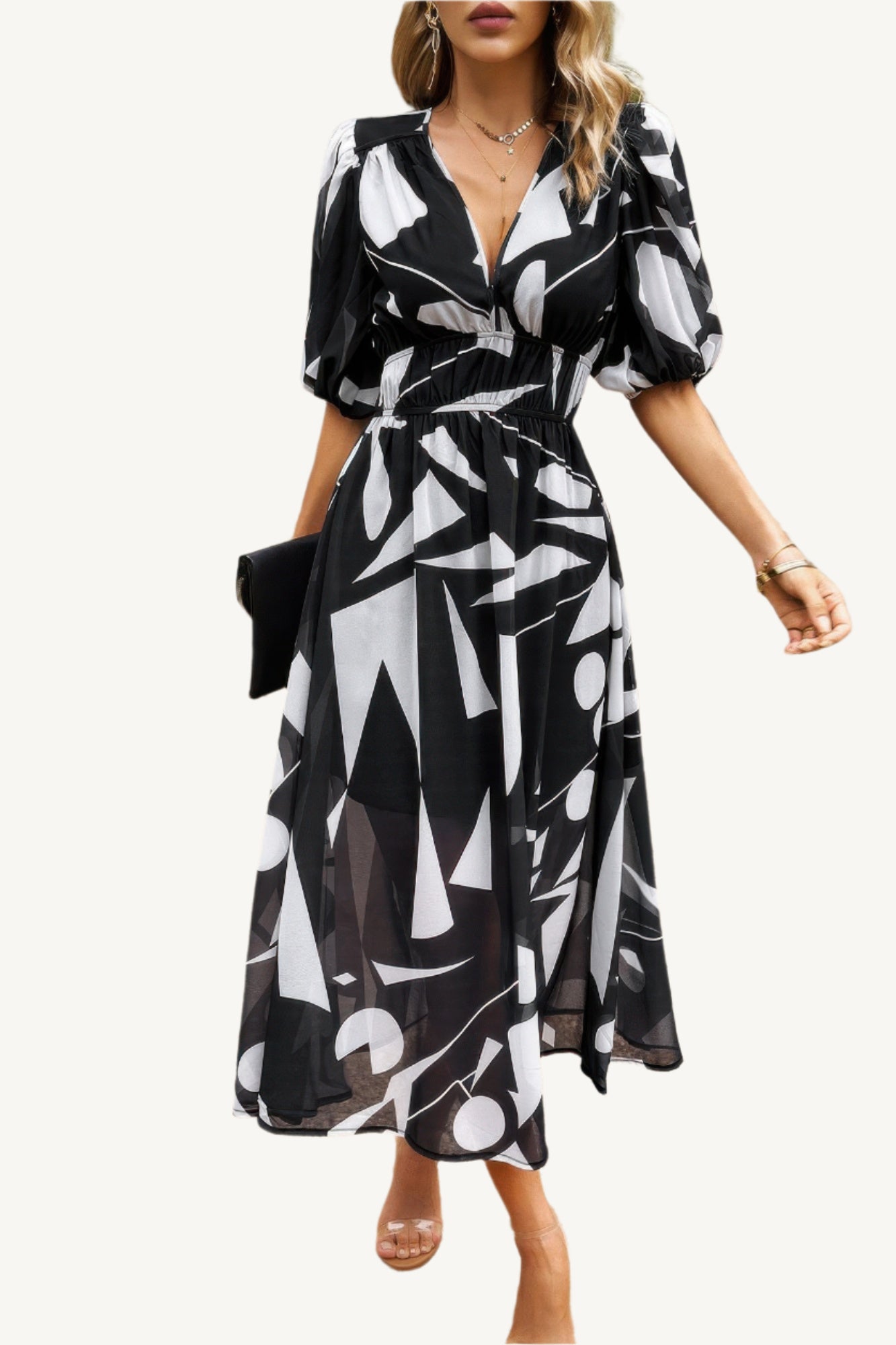Boho-style midi dress with V-neckline, elastic waist, and flowy silhouette – made from 100% viscose for breathable, lightweight comfort.