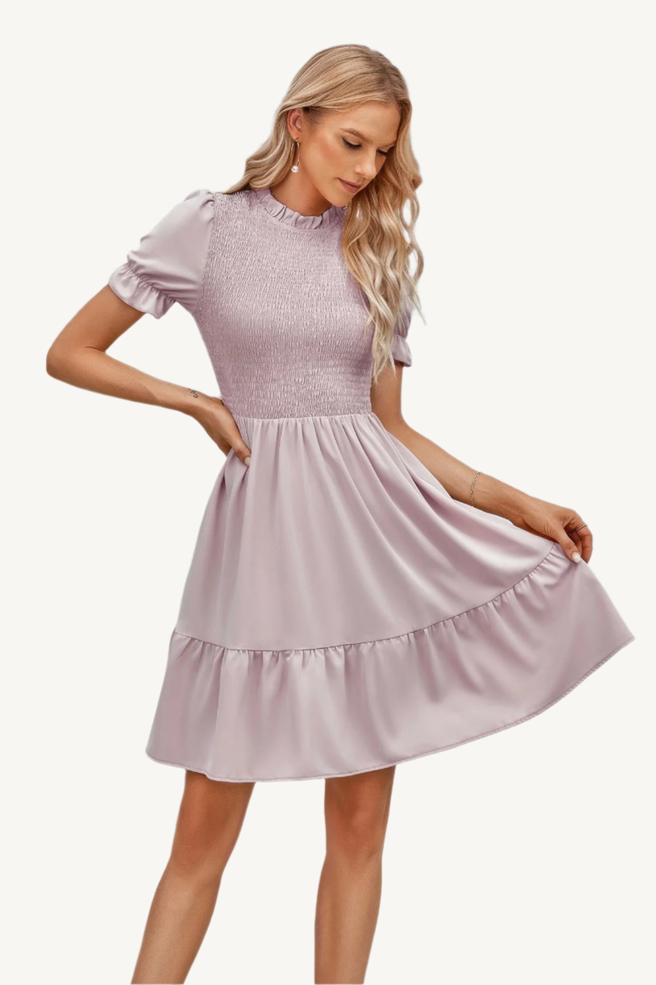 Solid puff sleeve dress with shirred bodice and ruffle hem, made from lightweight polyester – feminine, playful, and perfect for warm-weather days.