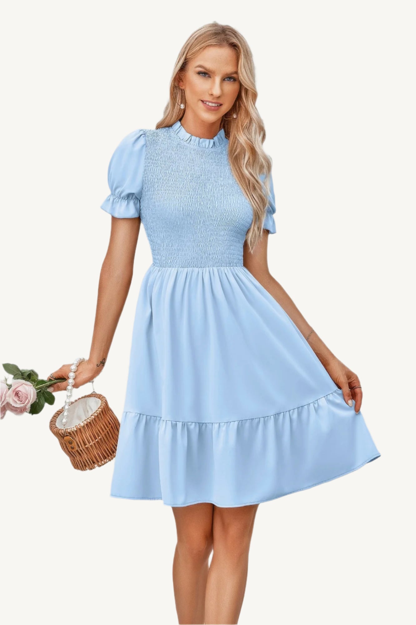 Solid puff sleeve dress with shirred bodice and ruffle hem, made from lightweight polyester – feminine, playful, and perfect for warm-weather days.