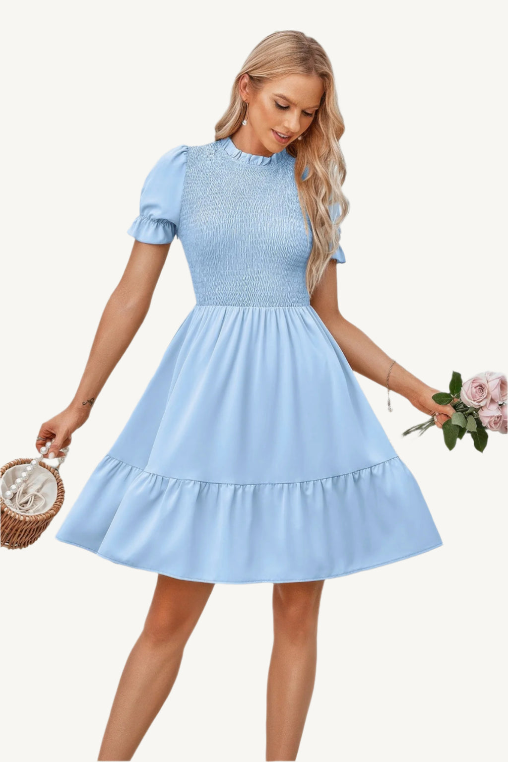 Solid puff sleeve dress with shirred bodice and ruffle hem, made from lightweight polyester – feminine, playful, and perfect for warm-weather days.