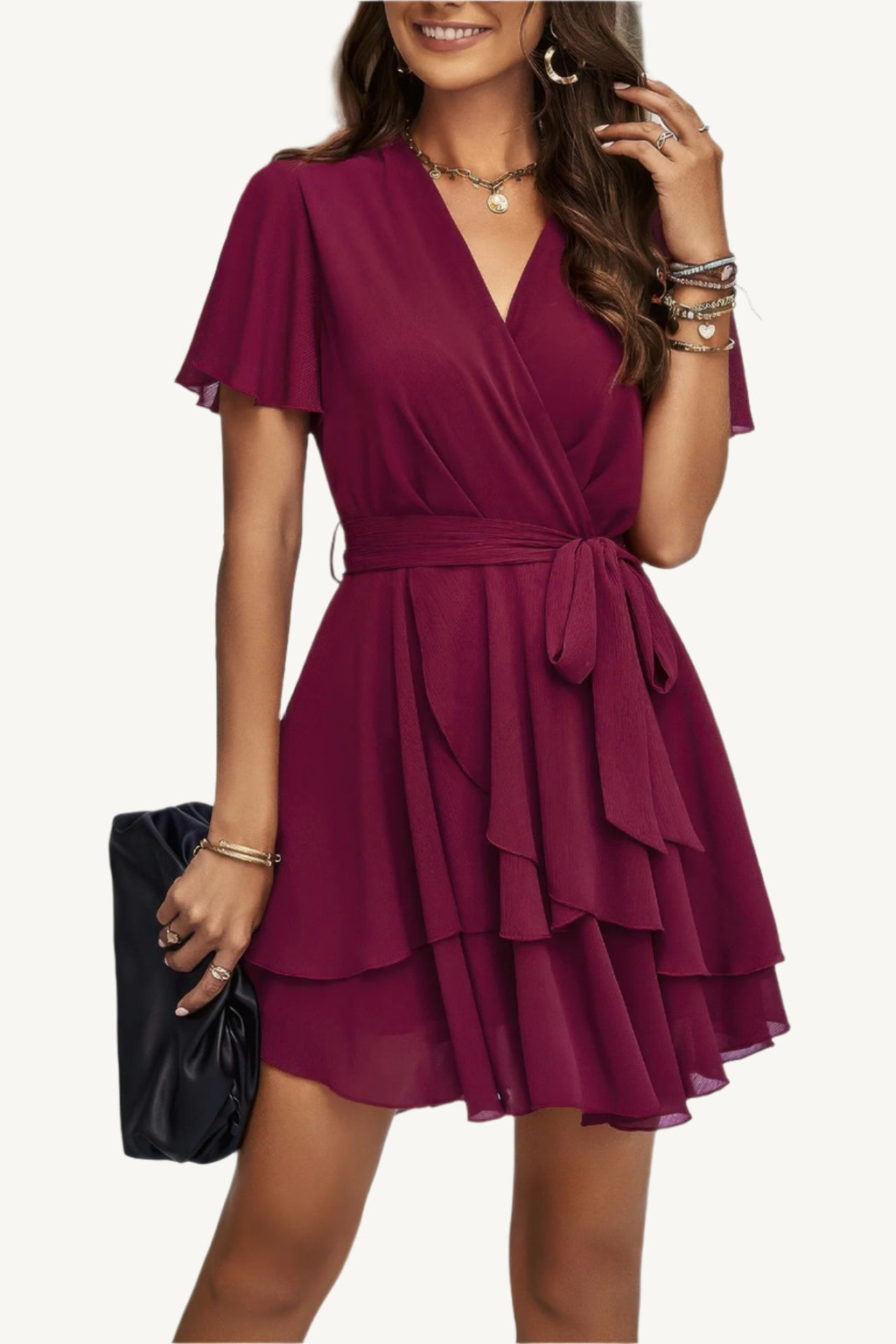 Lightweight chiffon dress with layered hem ruffles and a flattering waist tie – flowy, feminine, and perfect for warm-weather occasions.