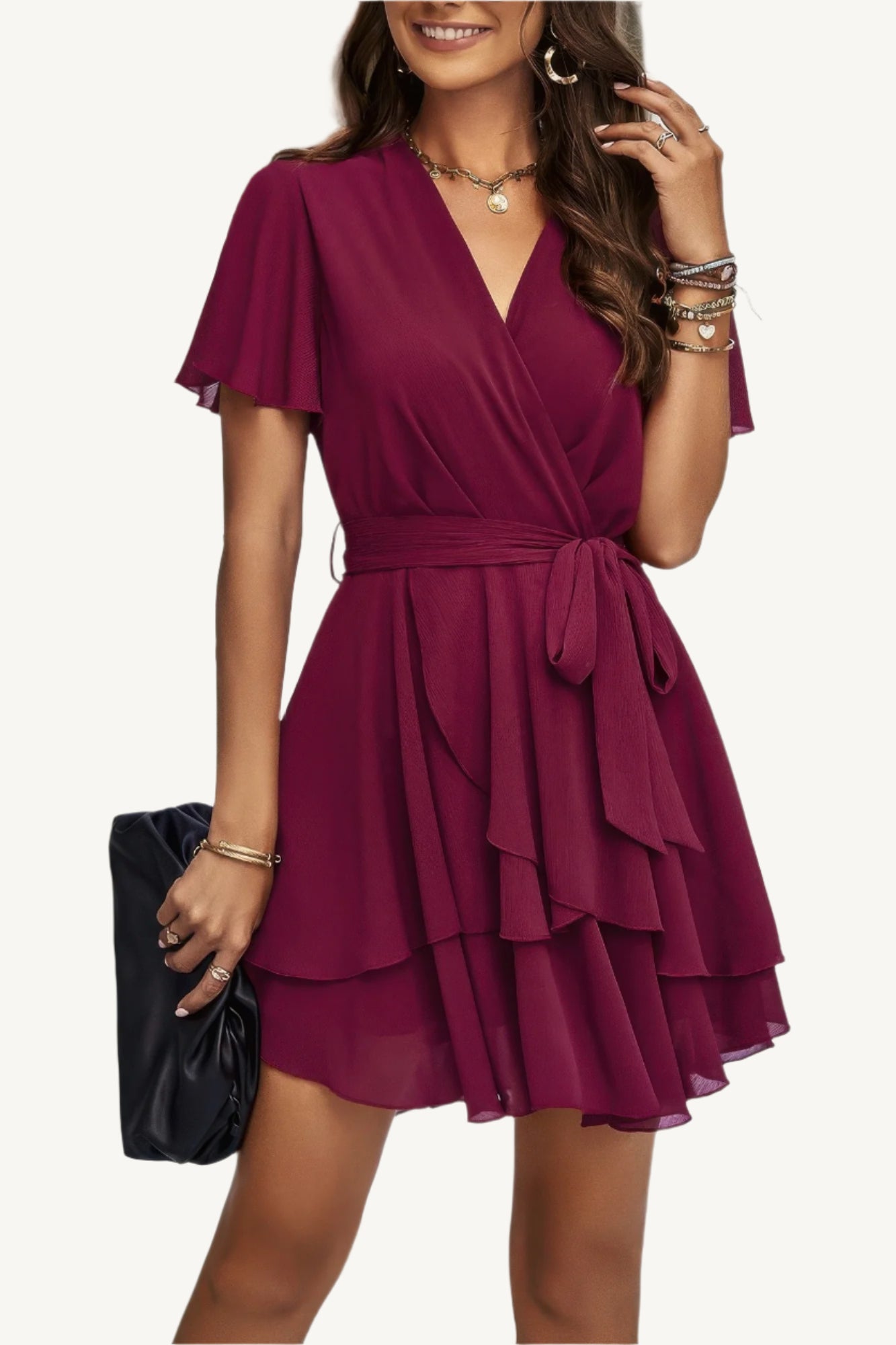Lightweight chiffon dress with layered hem ruffles and a flattering waist tie – flowy, feminine, and perfect for warm-weather occasions.