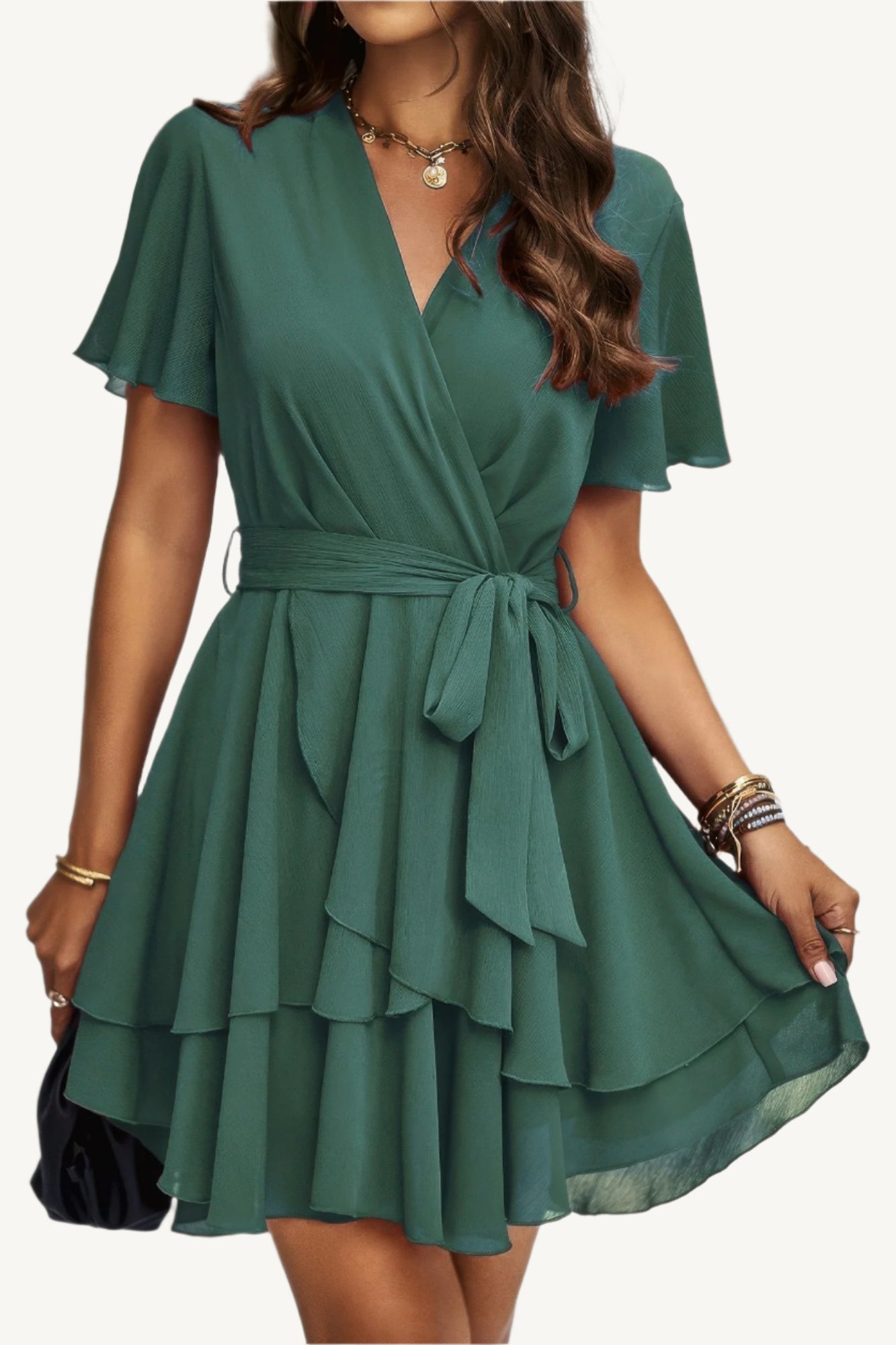 Lightweight chiffon dress with layered hem ruffles and a flattering waist tie – flowy, feminine, and perfect for warm-weather occasions.