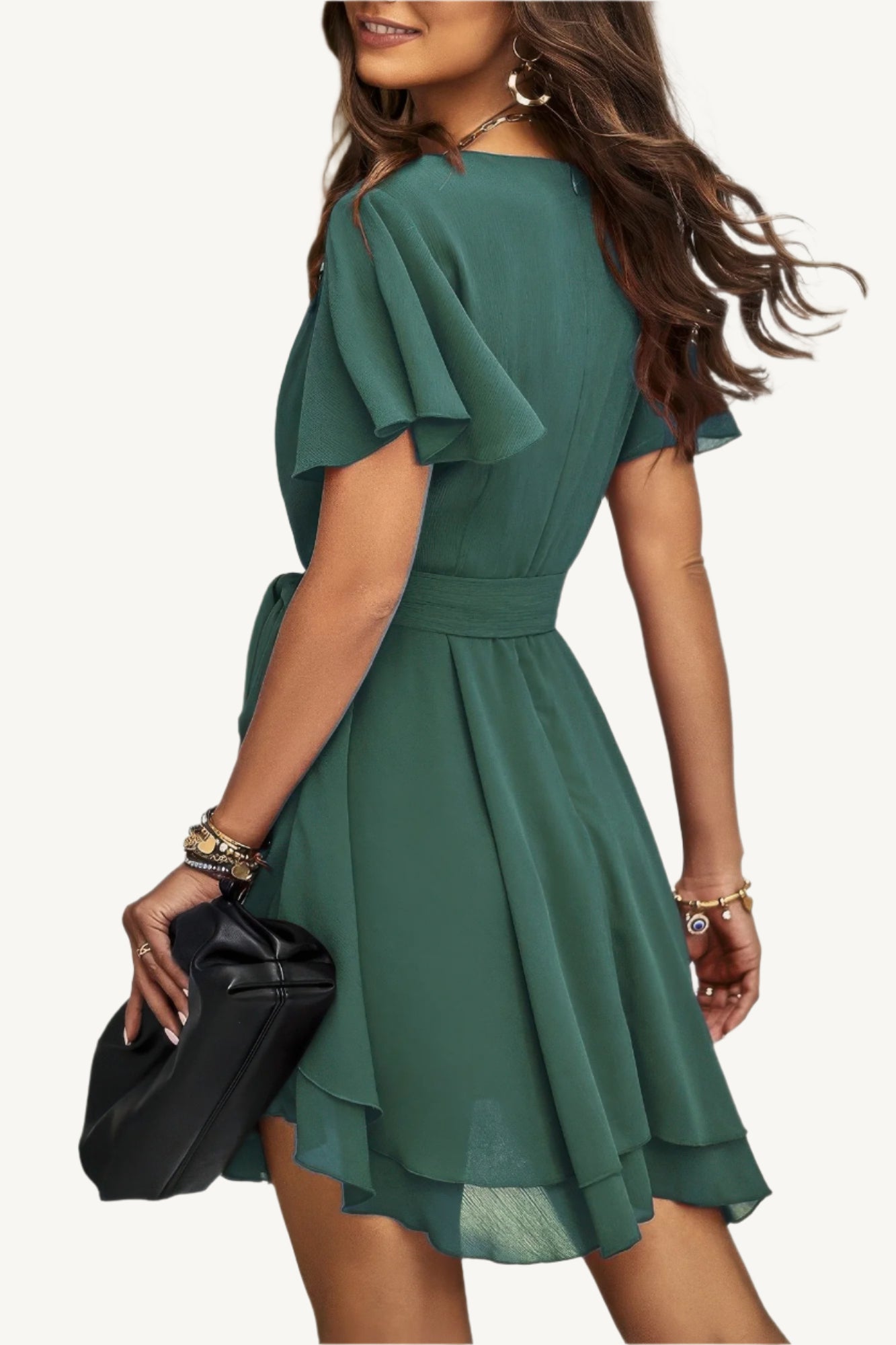 Lightweight chiffon dress with layered hem ruffles and a flattering waist tie – flowy, feminine, and perfect for warm-weather occasions.