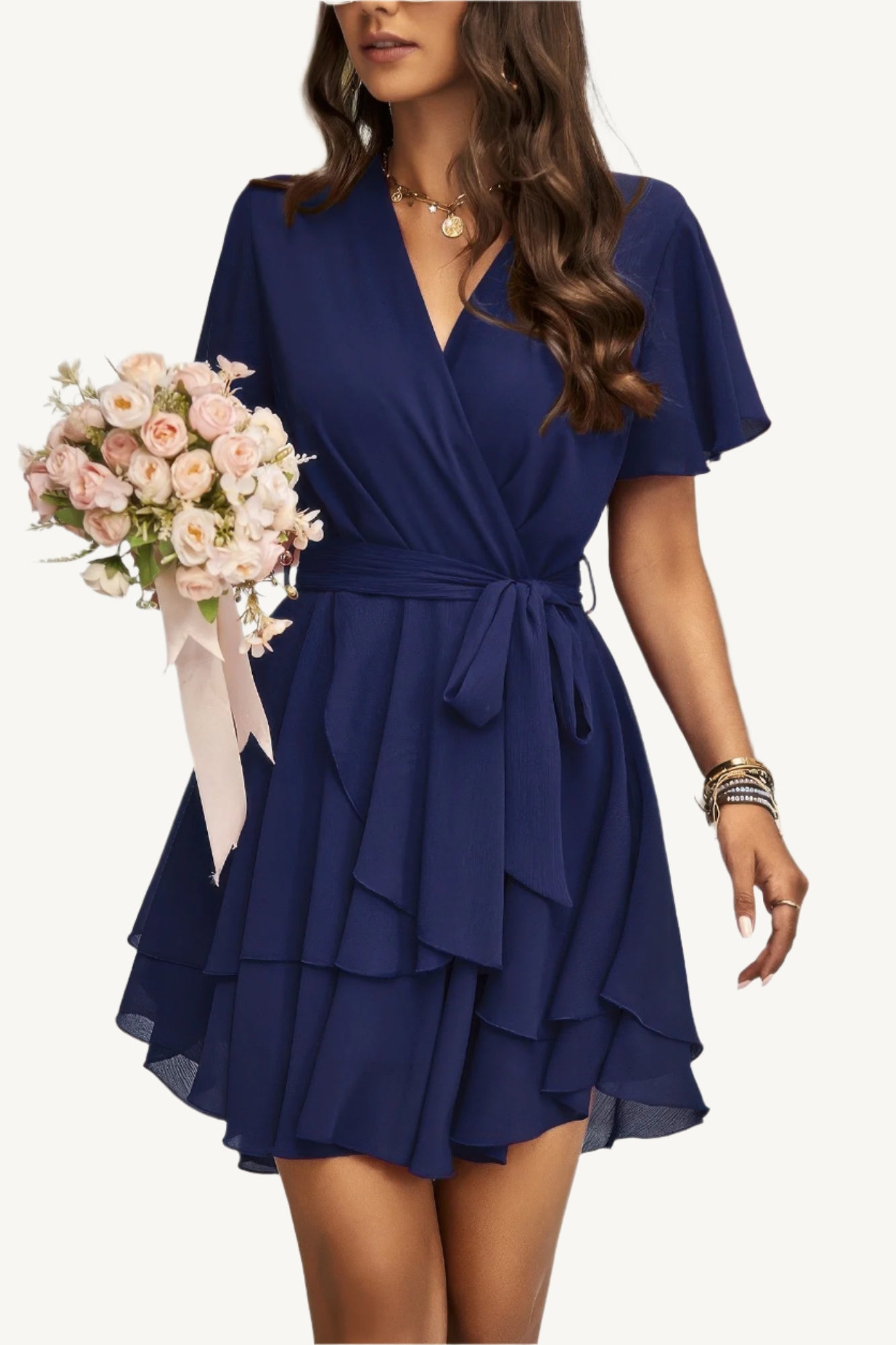 Lightweight chiffon dress with layered hem ruffles and a flattering waist tie – flowy, feminine, and perfect for warm-weather occasions.