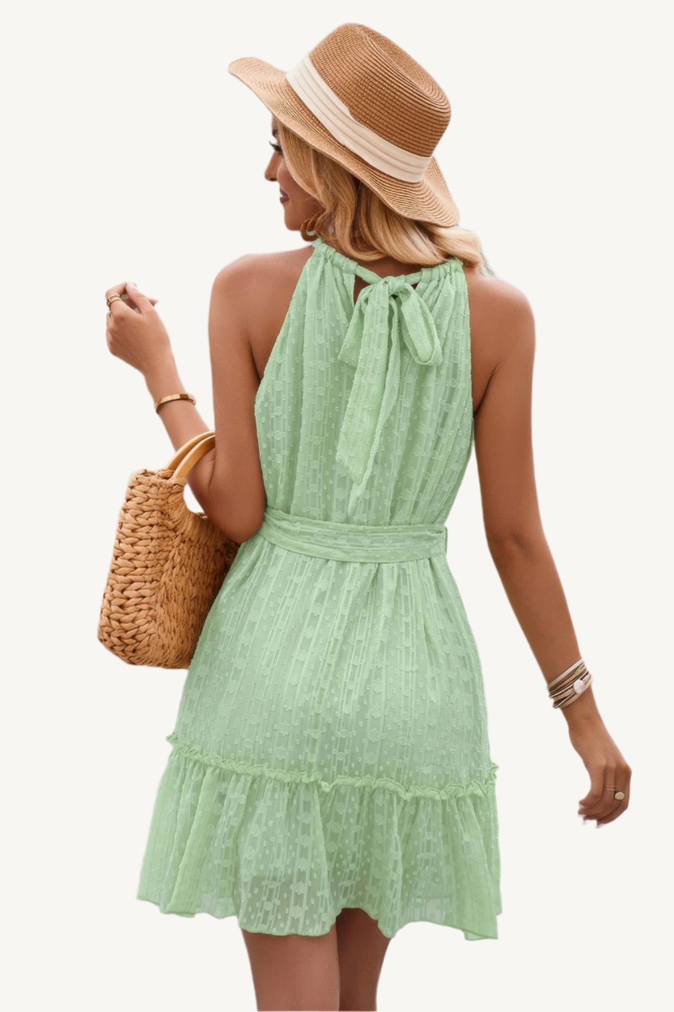 Solid halter neck dress with waist tie and ruffle detailing, made from lightweight polyester – chic, feminine, and perfect for any occasion.