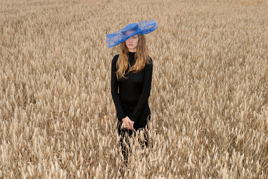 "Handmade Greed Hat with embossed letters, crafted on wooden lasts, bold statement accessory celebrating beauty and presence, from the Seven Sins collection."