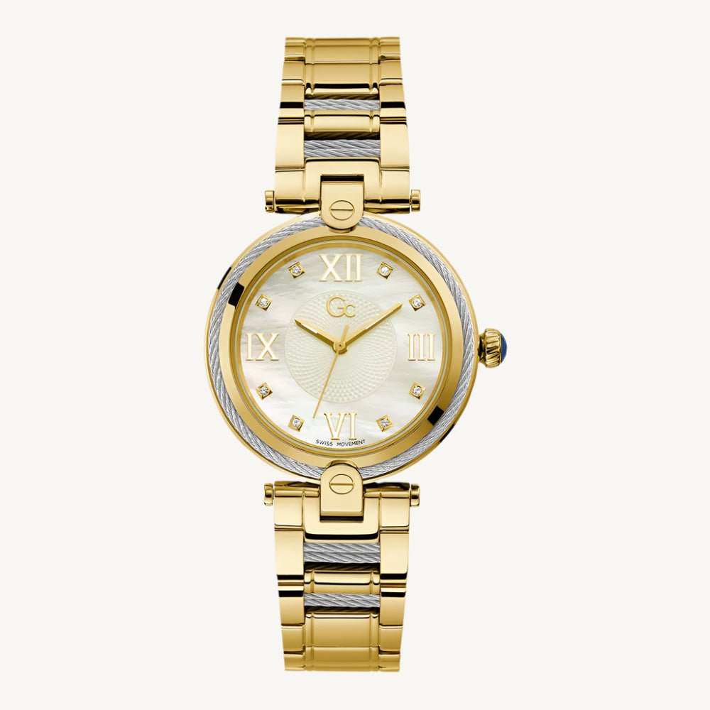 Elegant ladies' gold-tone stainless steel wristwatch with a white mother-of-pearl dial, sapphire glass, and stone-set face, water-resistant up to 100 meters.