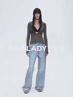 Person wearing a green top and light blue jeans on a white background with 'FIR LADY FUR' text.