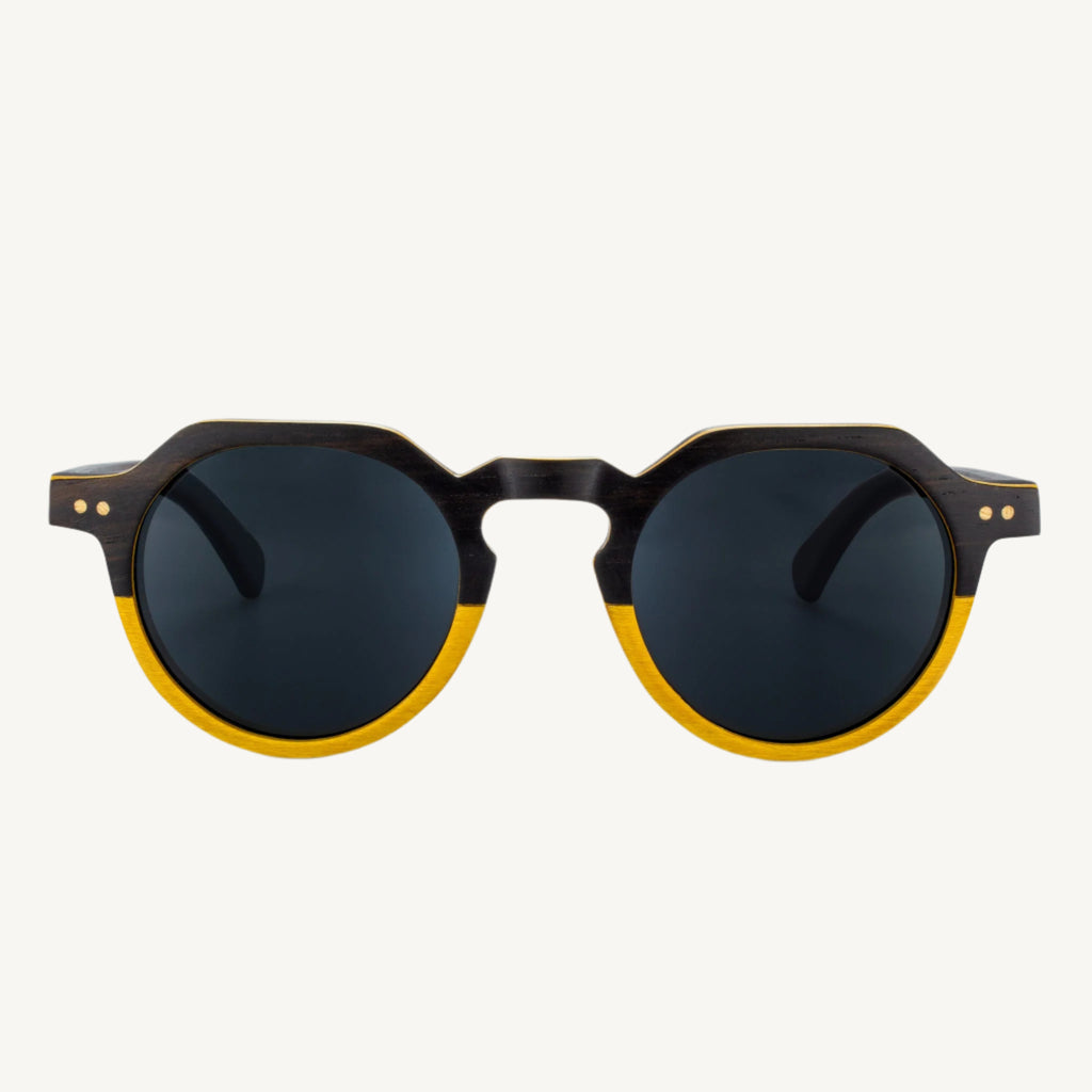 Anna Maria sunglasses — stylish and versatile with dapper round lenses and a soft, subtle keyhole bridge. Perfect for adding a classic touch to any look, whether you're on the go or relaxing in style.