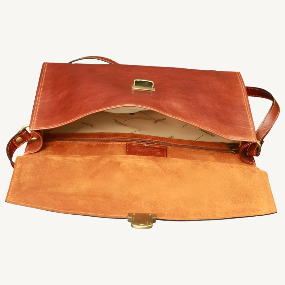 "Slim full-grain calfskin leather briefcase with lock and key closure, synthetic lining, and adjustable leather strap, perfect for modern professionals."