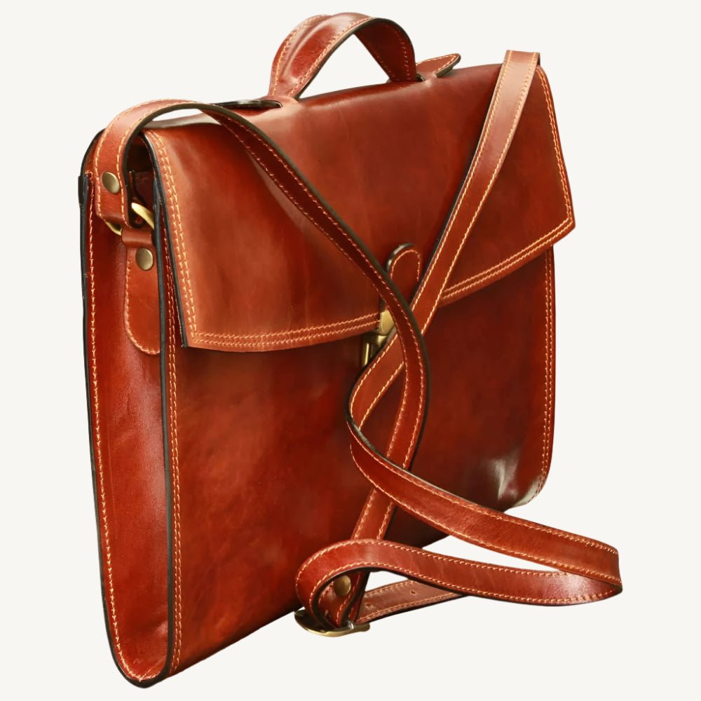 "Slim full-grain calfskin leather briefcase with lock and key closure, synthetic lining, and adjustable leather strap, perfect for modern professionals."