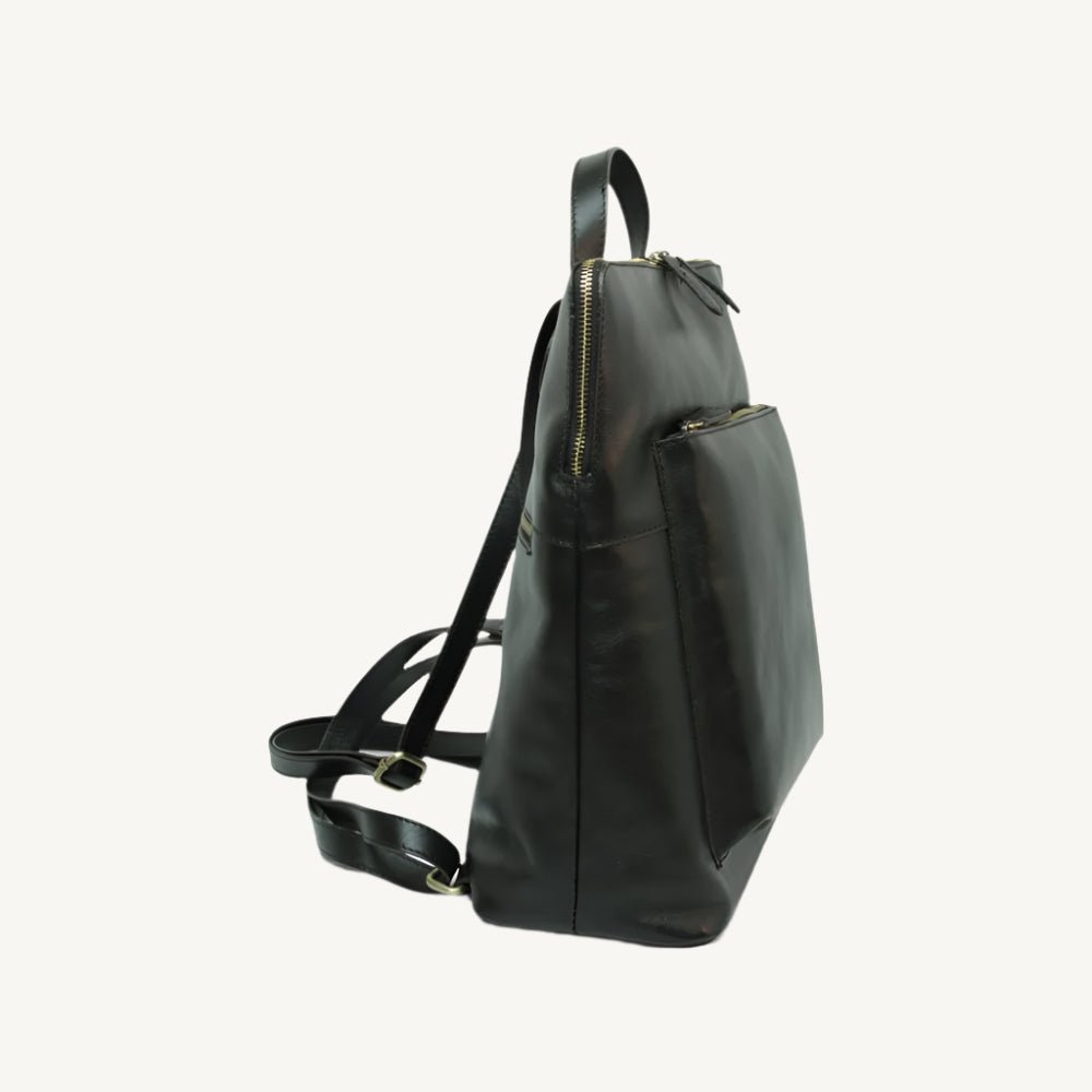 Full grain leather backpack, 30x39x11 cm, featuring “Made in Italy” polyester lining, two compartments, multiple zip pockets, and adjustable shoulder straps.