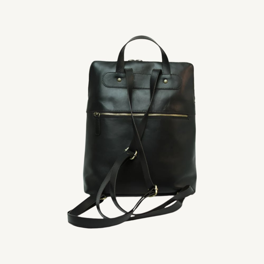 Full grain leather backpack, 30x39x11 cm, featuring “Made in Italy” polyester lining, two compartments, multiple zip pockets, and adjustable shoulder straps.