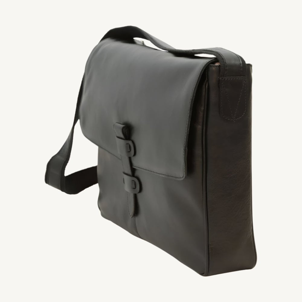 Black cowhide leather messenger bag with adjustable strap and practical inner compartments – sleek and versatile for everyday use.