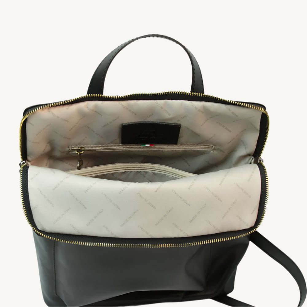 Full grain leather backpack, 30x39x11 cm, featuring “Made in Italy” polyester lining, two compartments, multiple zip pockets, and adjustable shoulder straps.