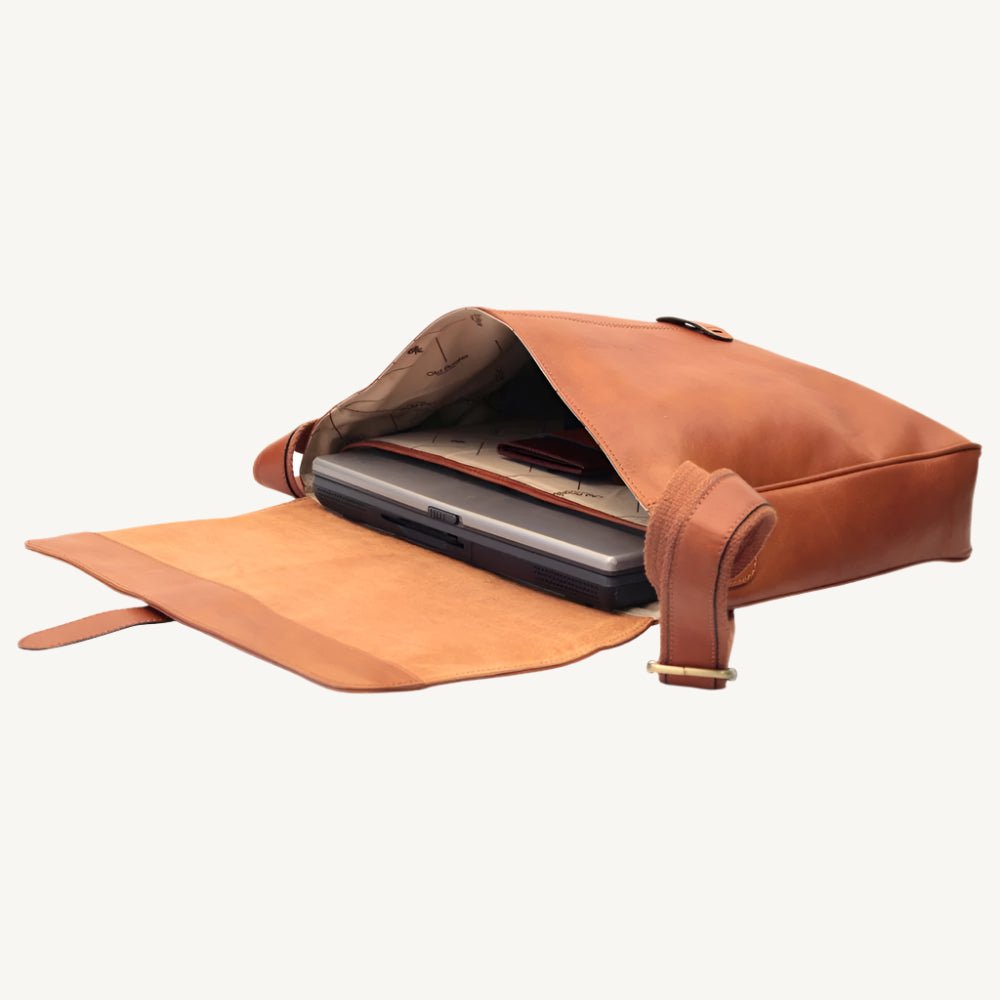 Full-grain calfskin leather messenger bag with padded tablet pocket, adjustable strap, and rear zip pocket – sleek and functional for everyday use.