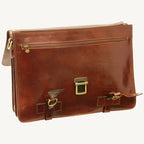 Handcrafted Italian brown leather briefcase made from full-grain calfskin, featuring classic buckle straps, flap closure, and interior compartments — elegant and functional for modern professionals.