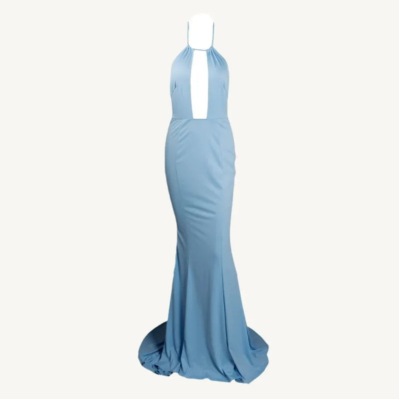 Graceful woman in a light blue Evelyn Belluci evening gown with a deep plunge neckline and flowing silhouette — perfect for weddings, galas, and elegant events.