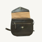 Elegant full-grain calfskin leather shoulder bag with front and back zippered pockets, leather lining, and adjustable strap.