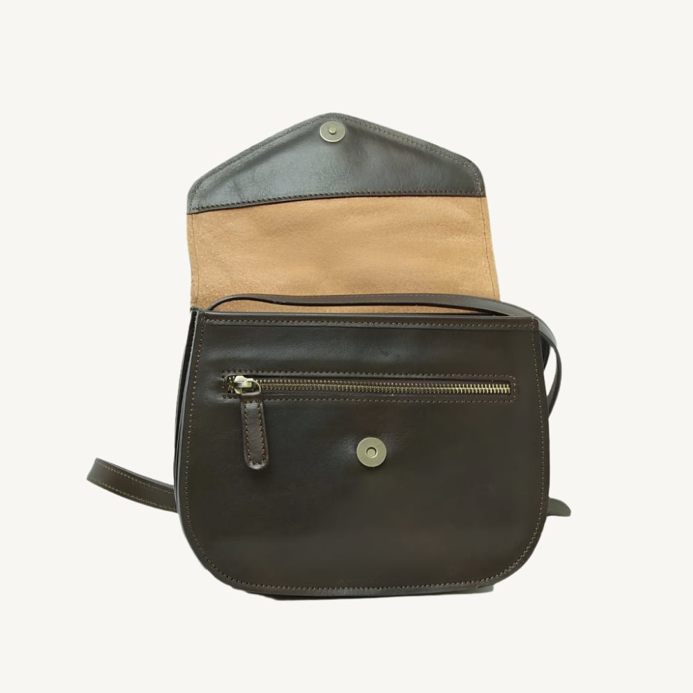 Elegant full-grain calfskin leather shoulder bag with front and back zippered pockets, leather lining, and adjustable strap.