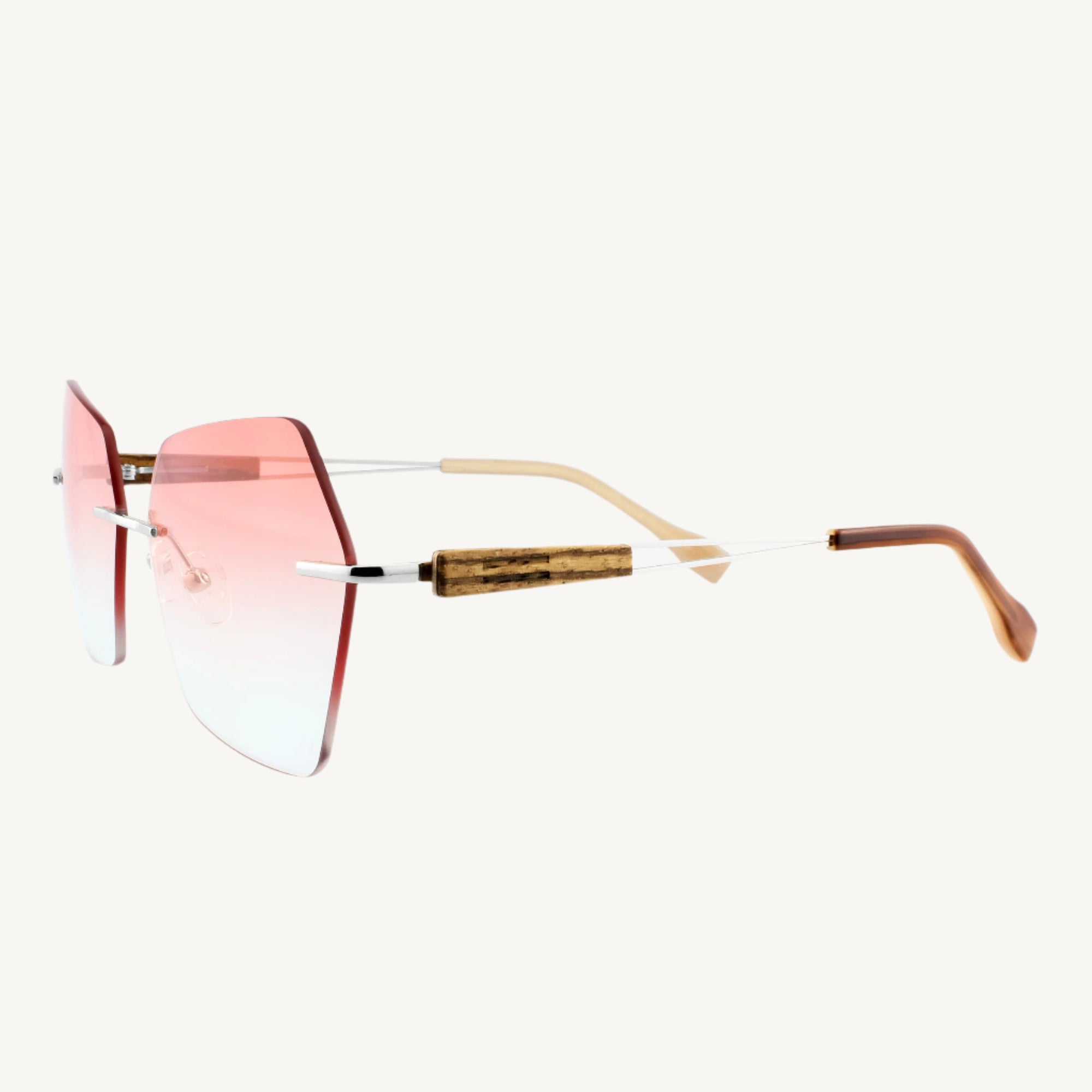 Cocoa metal and wood sunglasses — modern, stylish, and durable, featuring a unique combination of sleek metal frames and natural wood accents. Perfect for a chic and contemporary look.