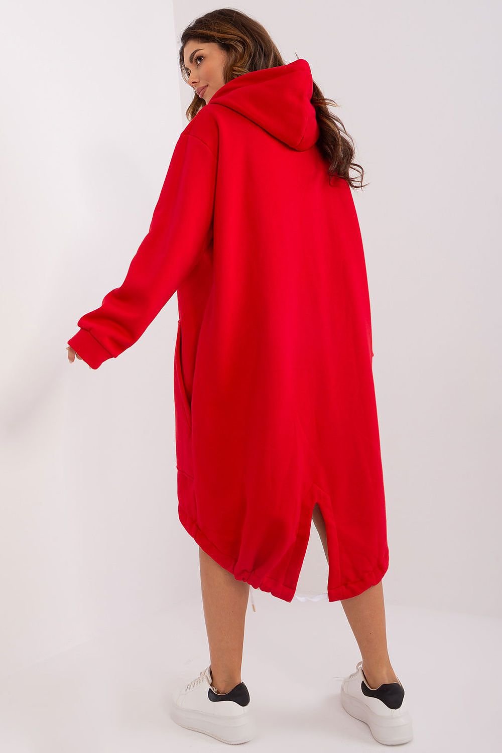 Person wearing a red hoodie on a white background