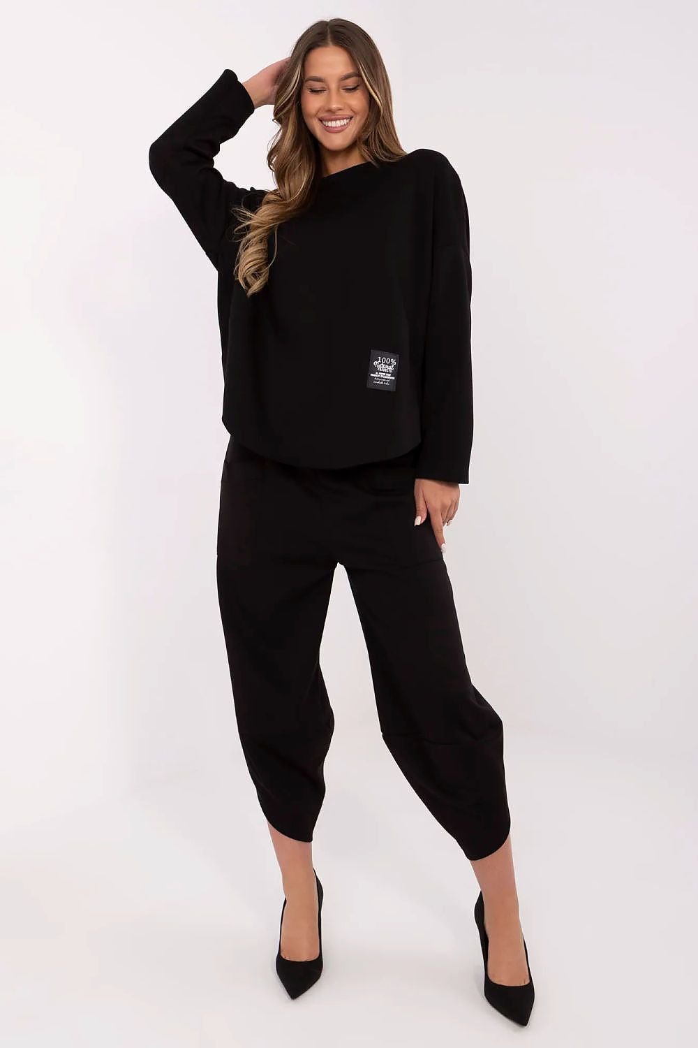 women in black trousers and blouse in set 