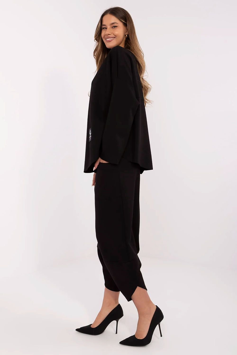 women in black trousers and blouse in set 