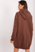 Brown hoodie worn by a person on a white background