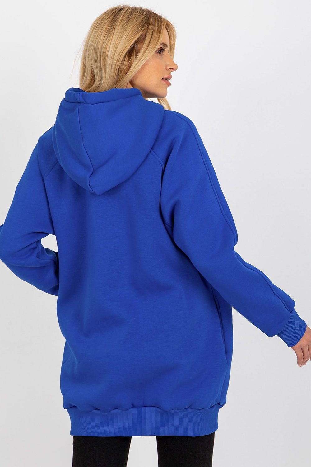 Person wearing a blue hoodie on a white background