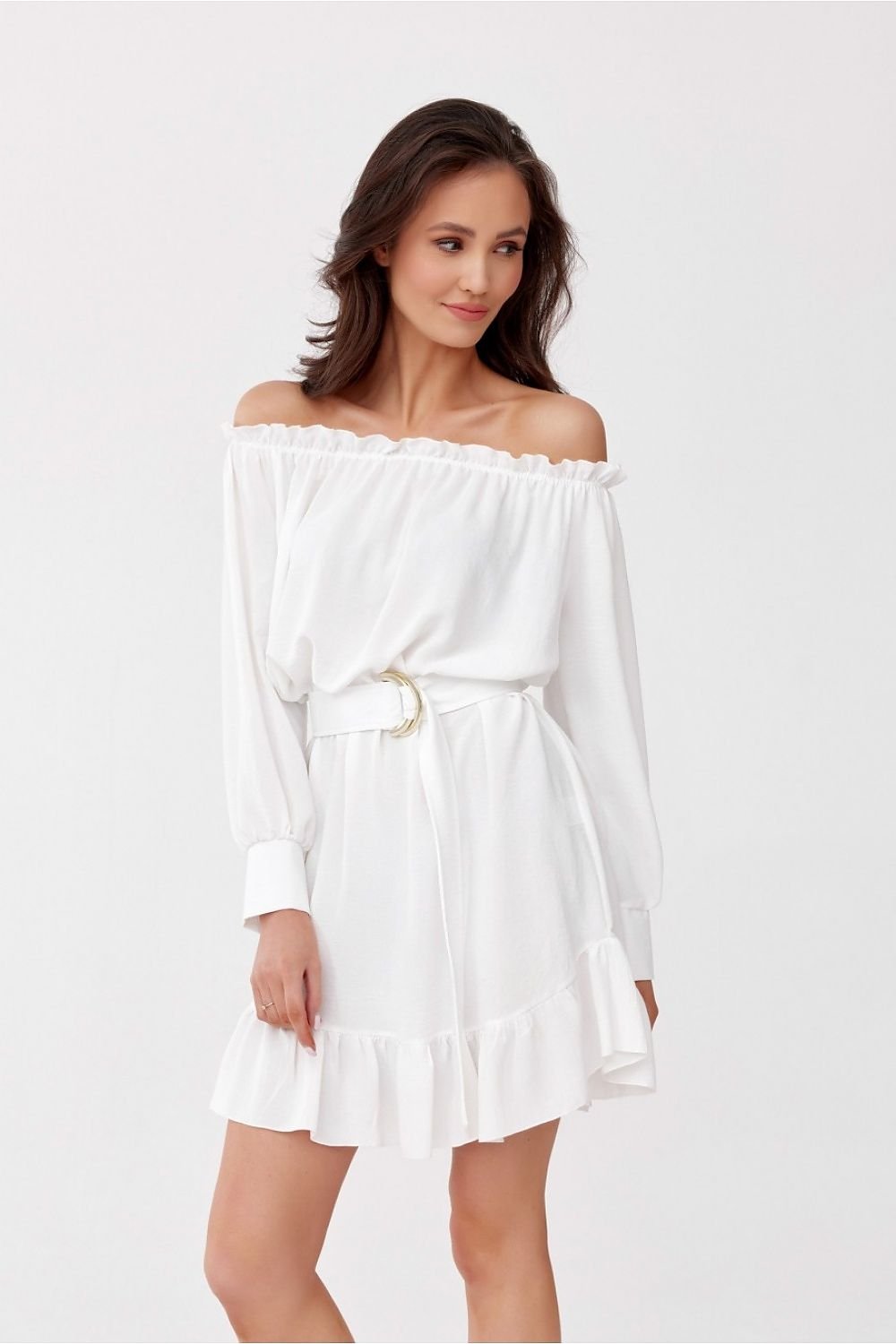 Woman wearing a white off-shoulder dress on a white background