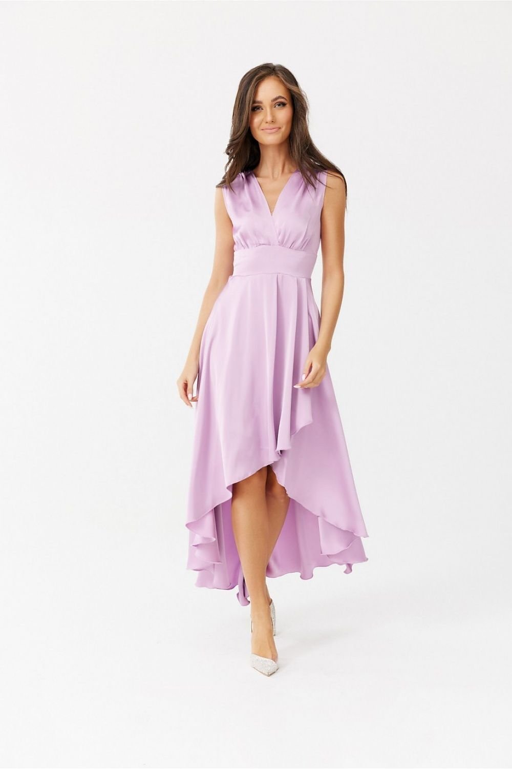 Woman wearing a light purple dress on a white background