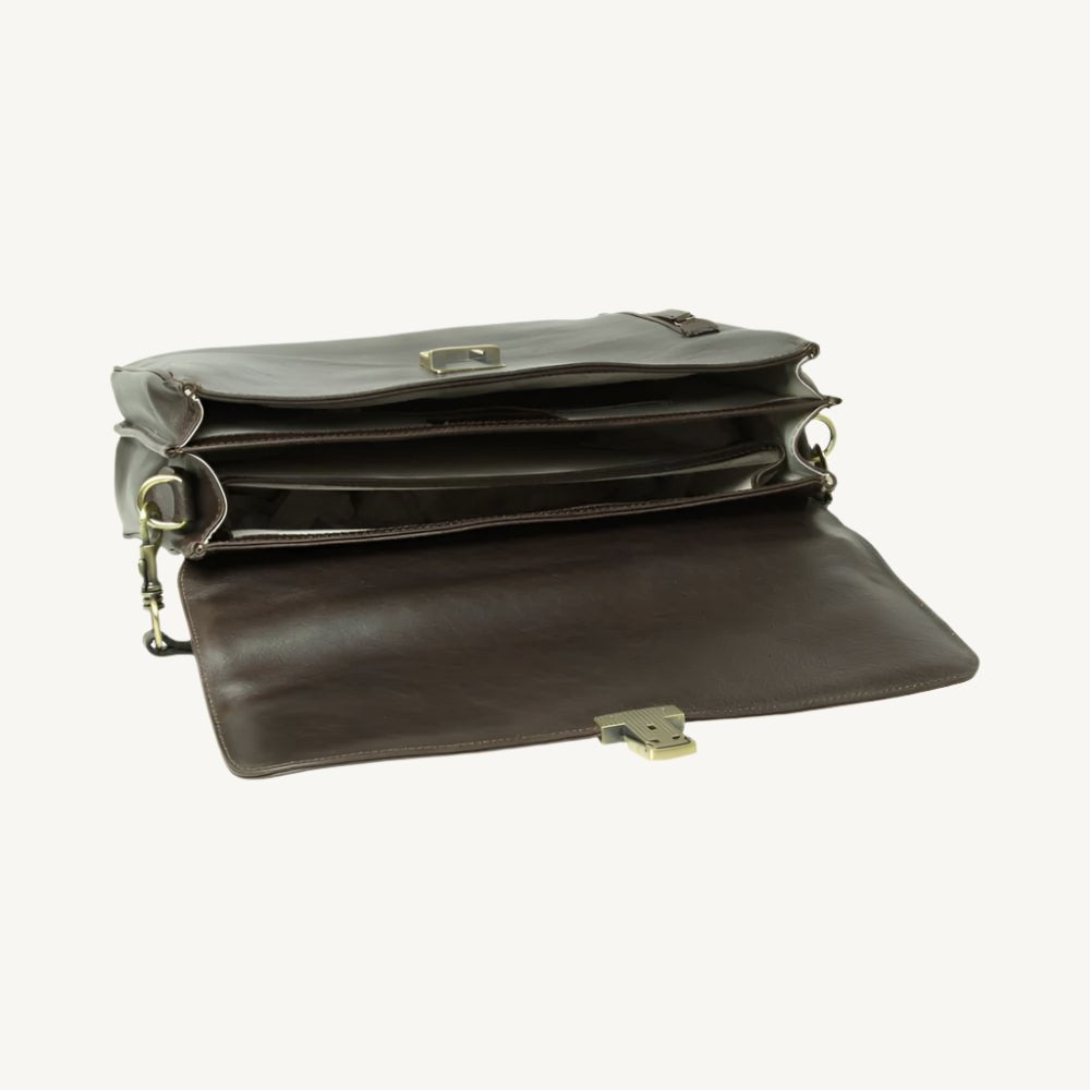 Full grain leather briefcase with clasp flap, laptop compartment, synthetic lining, phone pocket, pen holder, and removable leather shoulder strap.