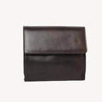 "Full-grain calfskin leather shoulder bag with three compartments, zippered rear pocket, and adjustable shoulder strap"