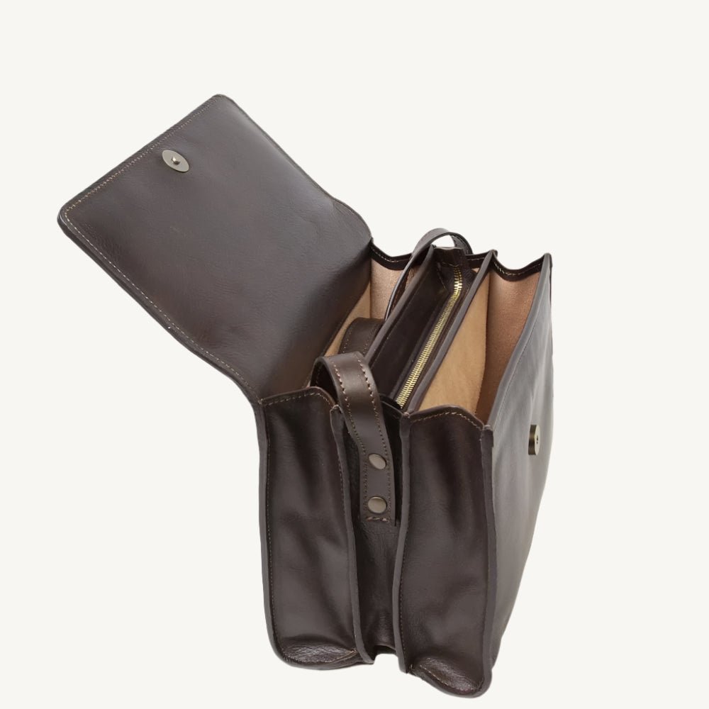 "Full-grain calfskin leather shoulder bag with three compartments, zippered rear pocket, and adjustable shoulder strap"